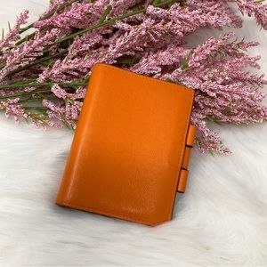 055 Pre-Owned Authentic HERMÈS Orange Leather Planner/Diary Schedule Book Cover